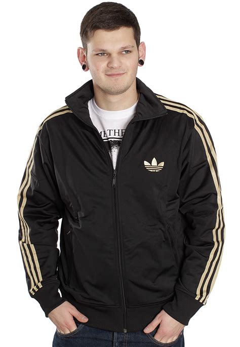 adidas firebird anzug schwarz gold|adidas Firebird Track Jackets.